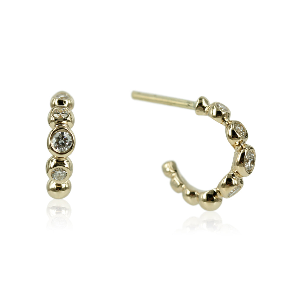 Bubbles - Smukke 14 kt. guld Creoler med smukke kugler der sidder smukt og elegant i forløb. Creolerne kan vælges med og uden diamanter. .