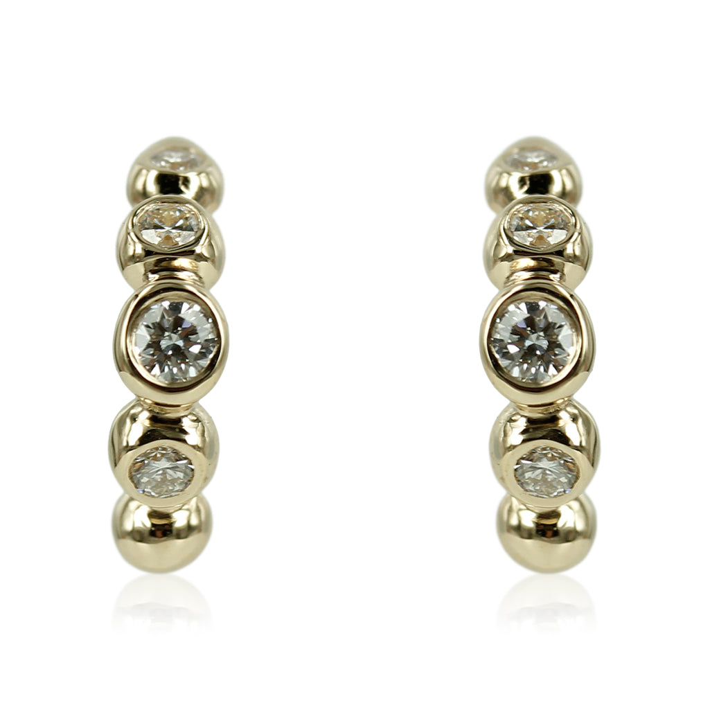 0,15 ct ialt - Bubbles - Smukke 14 kt. guld Creoler med smukke kugler der sidder smukt og elegant i forløb. Creolerne kan vælges med og uden diamanter.