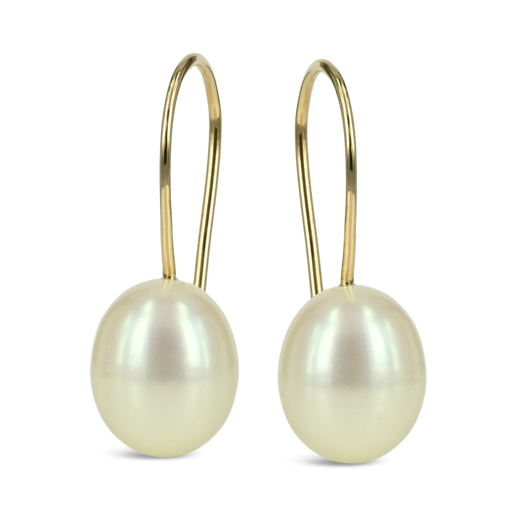 14 kt. Guld ørering med hvide perle