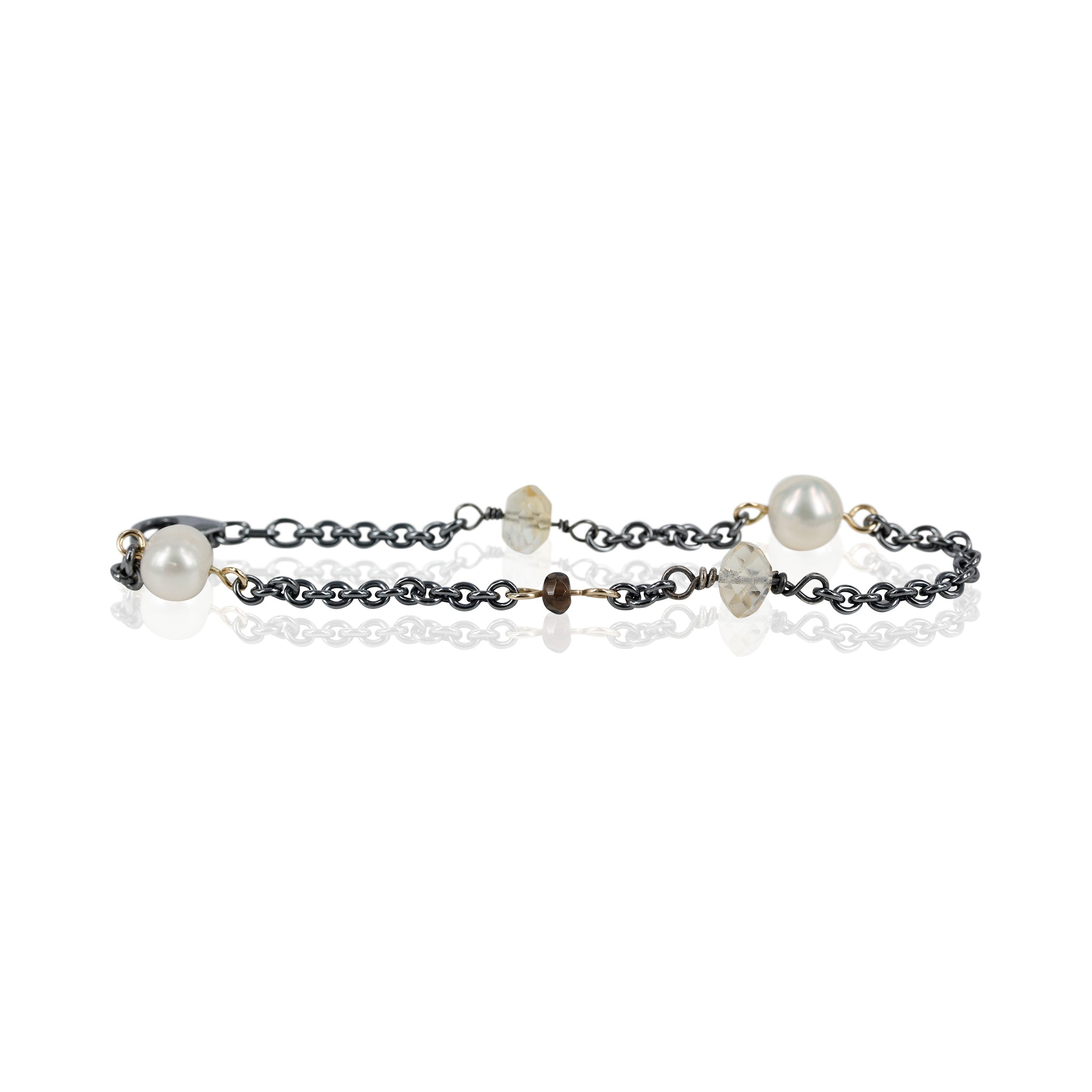 Sølvarmbånd med hvide perler