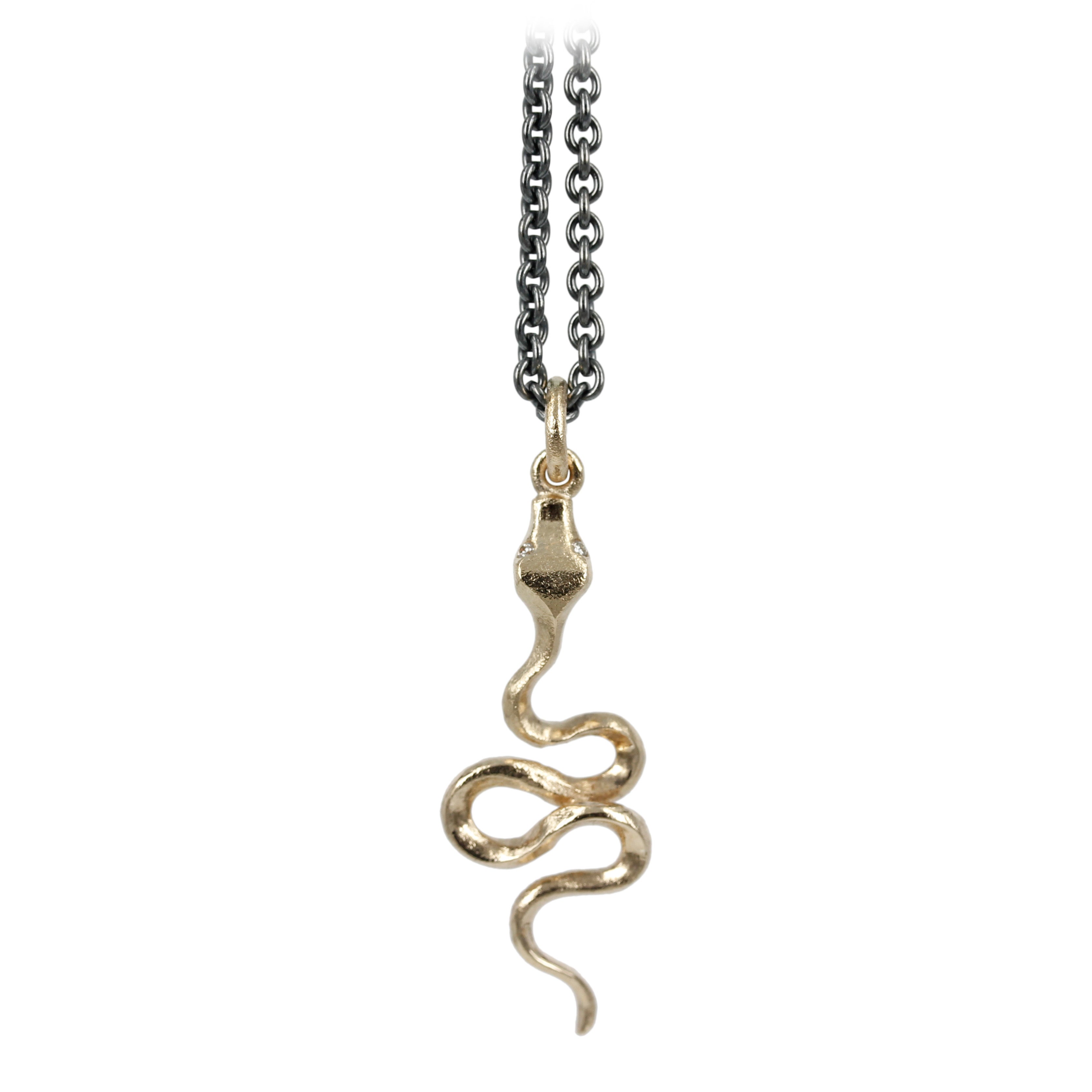 Snake - 14 kt guldvedhæng udformet som en fin slange der slynger sig afsted.
